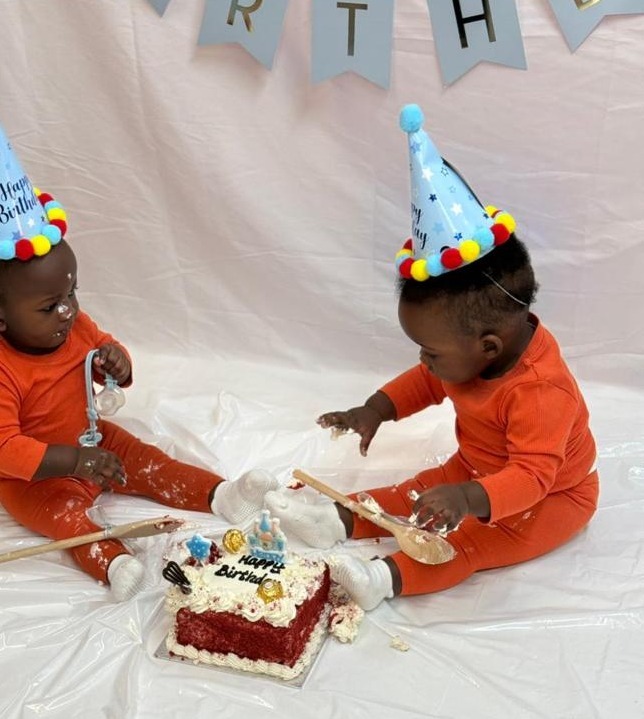 Twin cake smash session with bunting & party hats