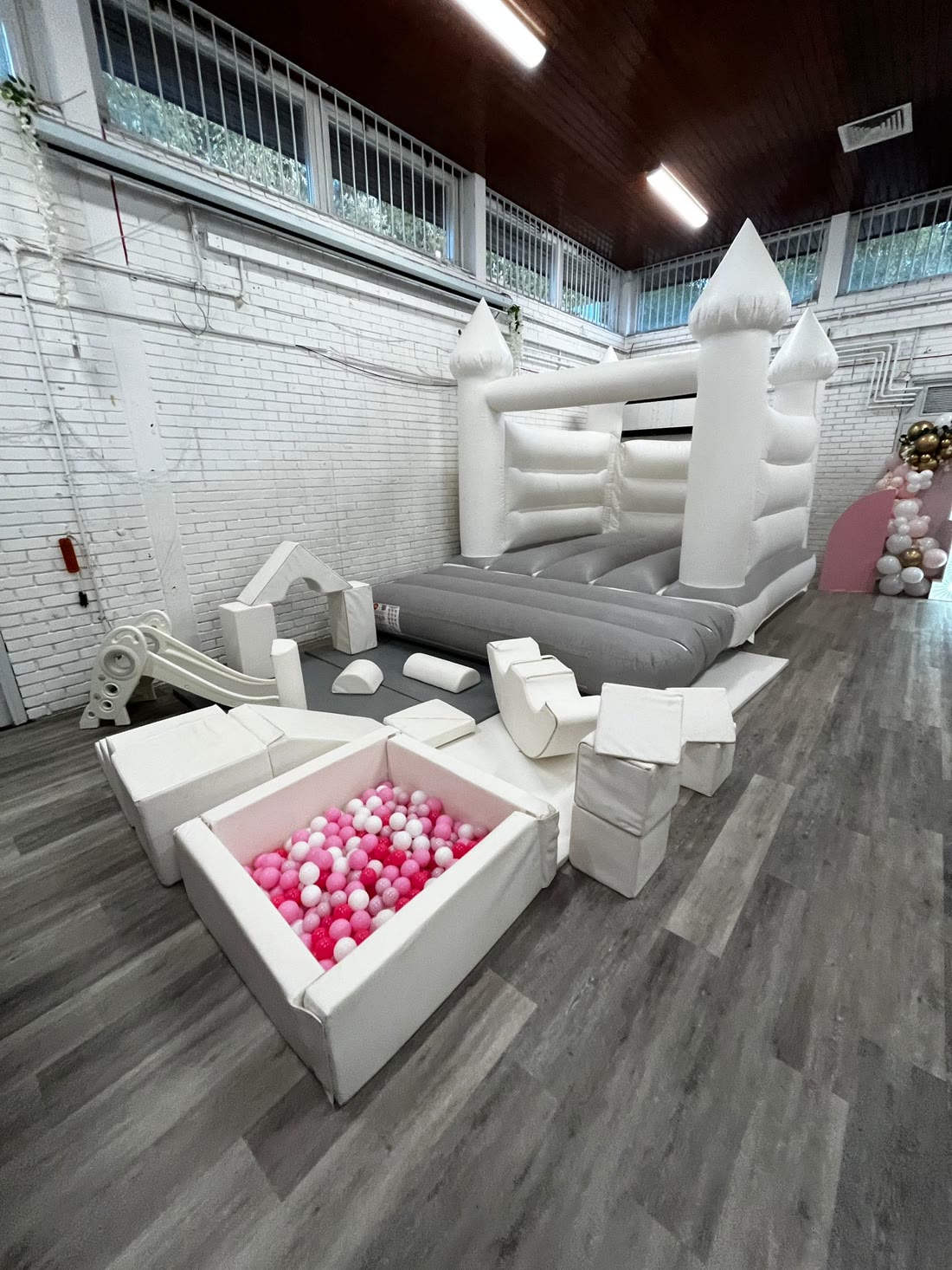 White & grey soft play — inflatable, foam climbing blocks, slide & ball pit